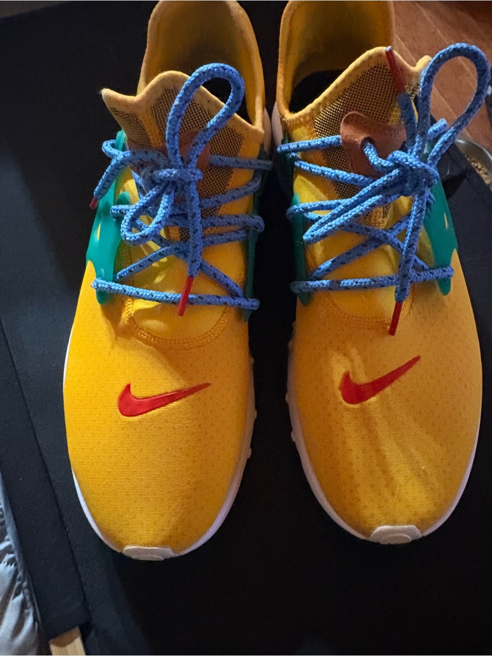 PRICE IS FIRM.  Nike Men’s Yellow Athletic Shoes with Blue Laces